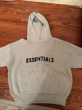 Essentials Hoodie in Light Gray Knit with Black Logo size small has been worn